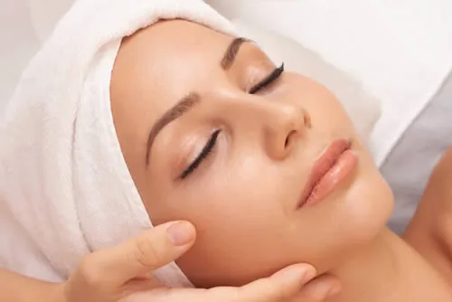 age-spots woman-doing-pelleve-procedure-cosmetic dermatology